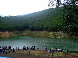 Tourists enjoying the natural echo phenomenon at Echo Point Kerala