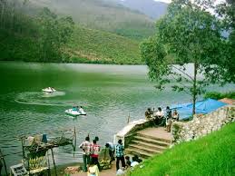 Lush green landscape and lake at Echo Point Idukki