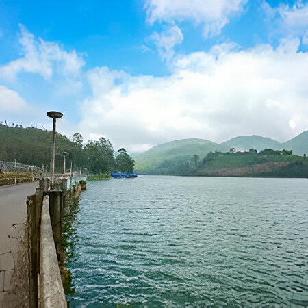 Scenic view of Mattupetty Lake and hills