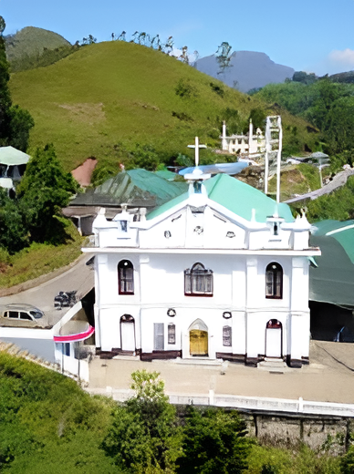 Colonial-style Mount Carmel Church facade in Idukki