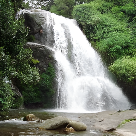 Tourists enjoying nature trails at Nyayamakad Waterfalls, Kerala